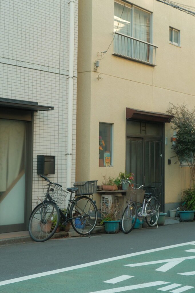 Bikes against a wall in Tokyo, Japan