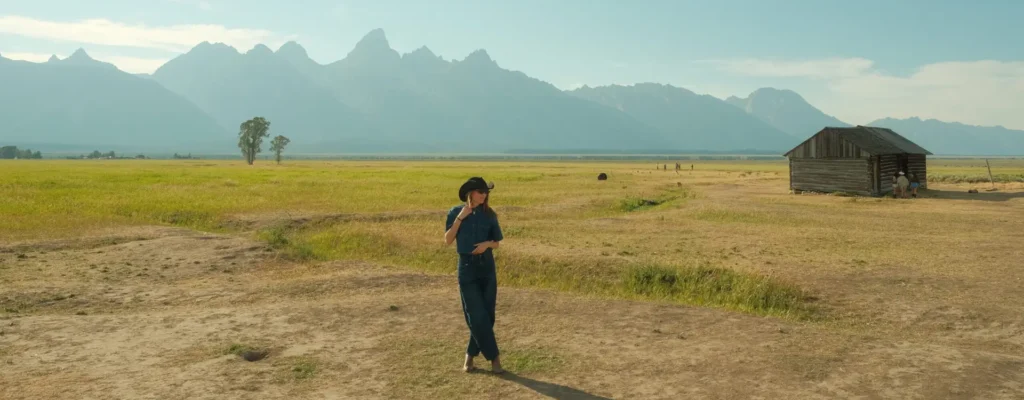 Standing in front of the Teton mountain range in Jackson, Wyoming