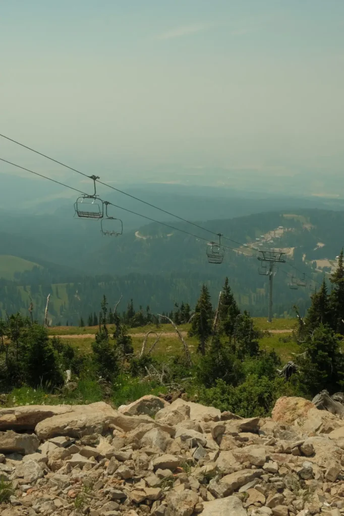 Chairlift over mountains and trees at grand Targhee resort