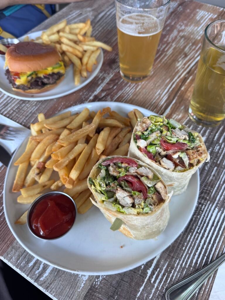 Chicken Caesar salad wrap and a burger and beers at Revelry in Bozeman, Montana