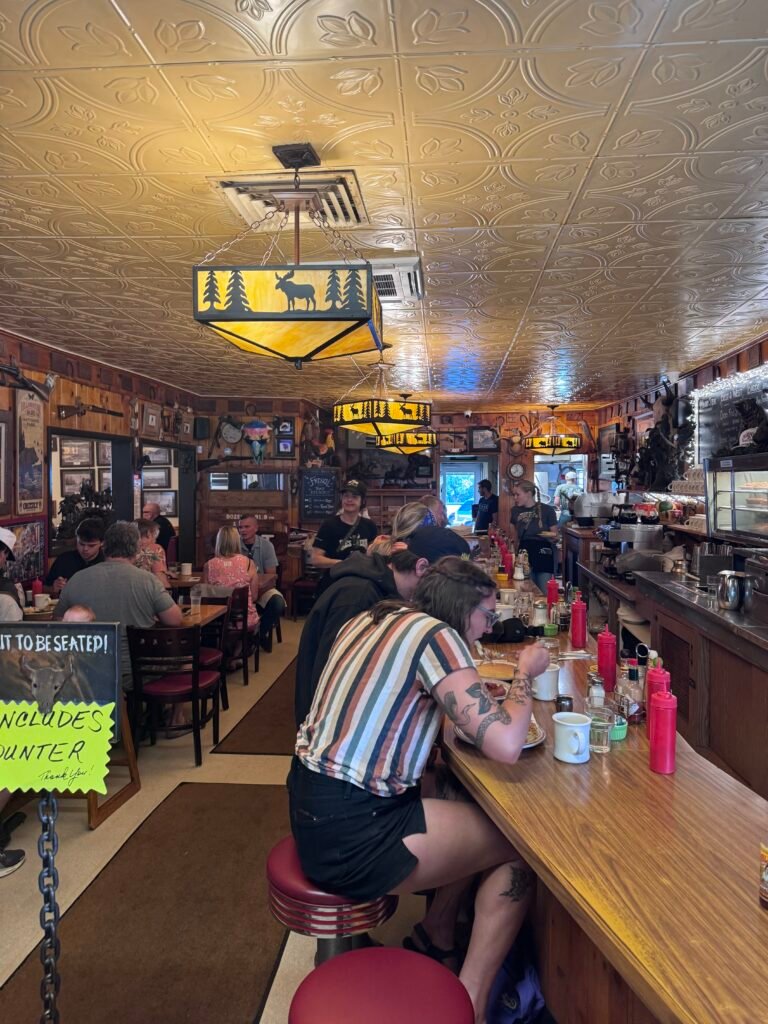 Diner with people sitting and western decor at Western Cafe in Bozeman, Montana