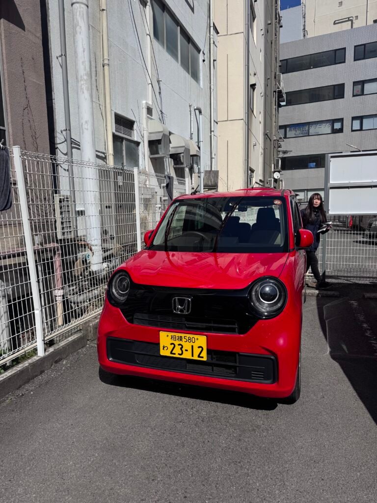 A red rental car in Hakone, Japan