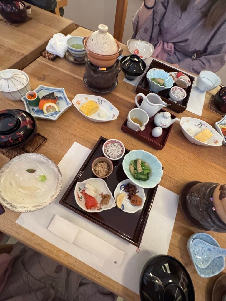 Lots of plates with traditional Japanese food at a ryokan in Hakone, Japan 