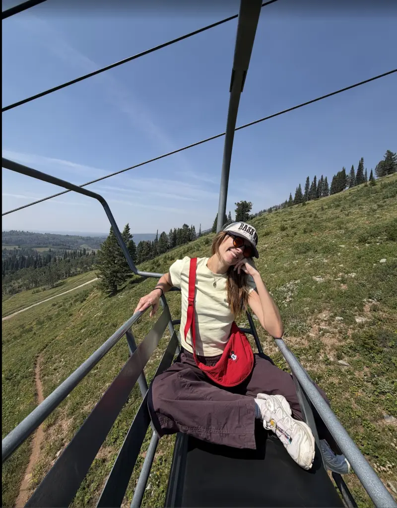 Woman riding the chairlift at Grand Targhee Resort in Driggs, Idaho