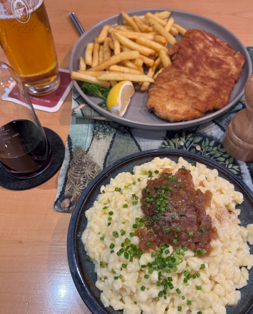 Plate of spätzle and schnitzel at a restaurant in Fussen, Germany